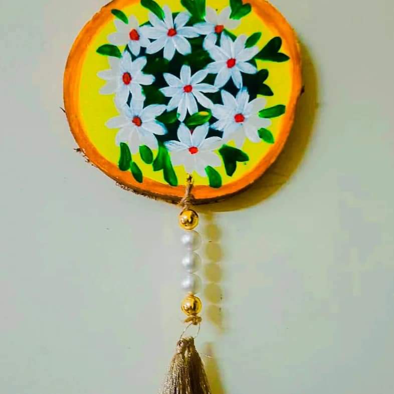 Hand painted wooden wall hanging